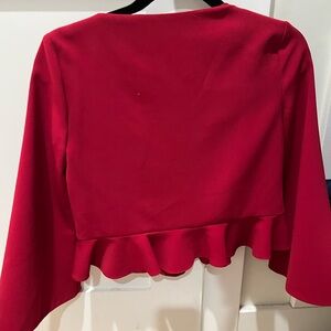 Cushnie et Ochs silk peplum blouse with deep v-neck. Size US 2.